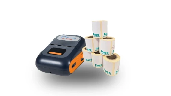 Pat testing label printer with stack of six rolls of first stop safety provided sticky labels